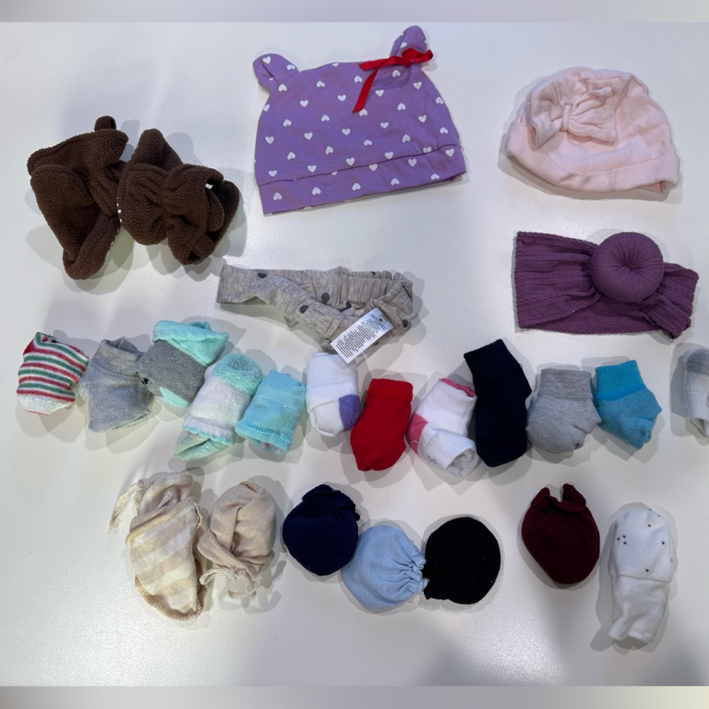 Lot of baby socks and accessories